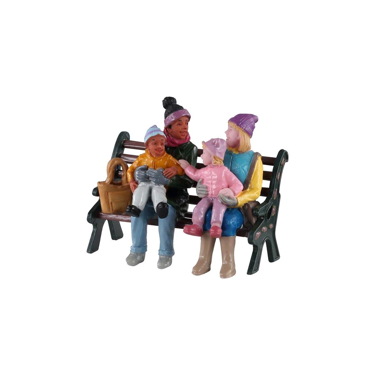 Mères et leurs enfants sur un banc au parc Lemax
