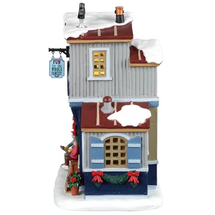 Maison lumineuse Location de patins à glace Lemax