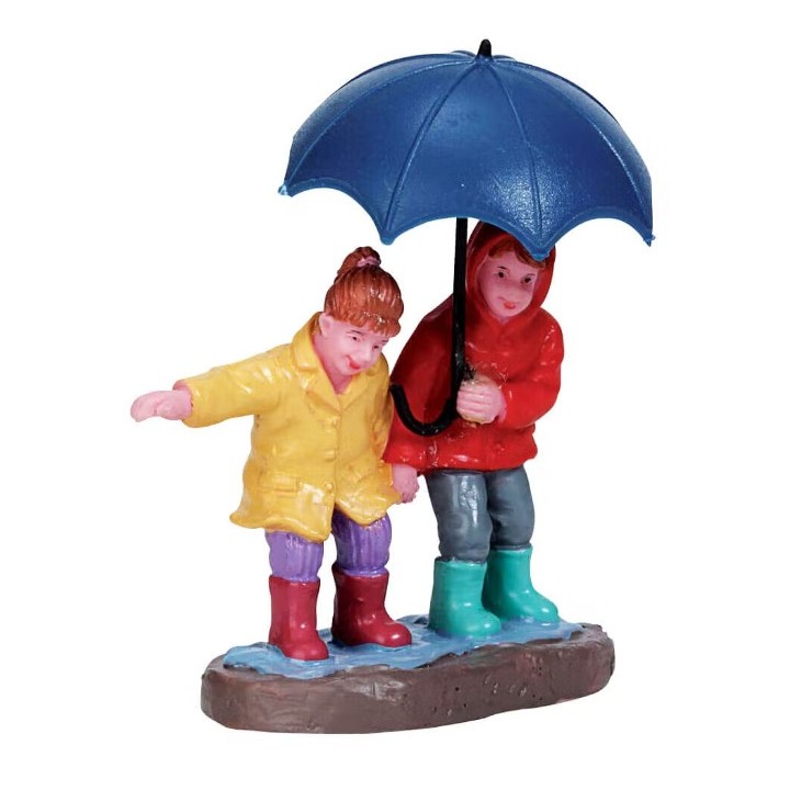 Enfants sautant dans les flaques Lemax