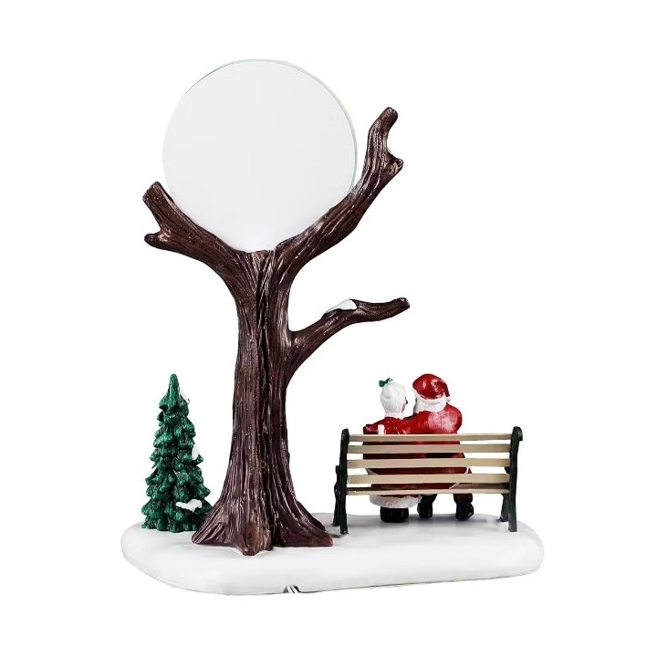 Père et mère Noël sous la lune lumineuse LEMAX