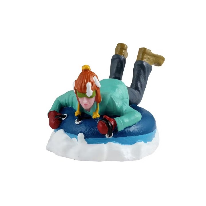 Enfant en bouée sur neige LEMAX