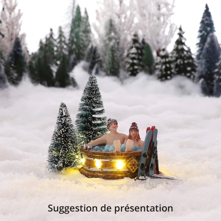 Couple dans jacuzzi enneigé lumineux LUVILLE